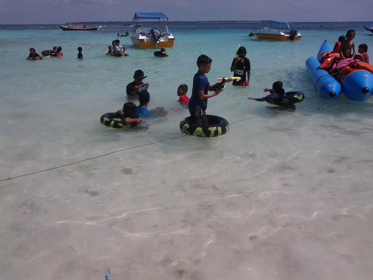 Penginapan Asidik Bira Buitenkant foto