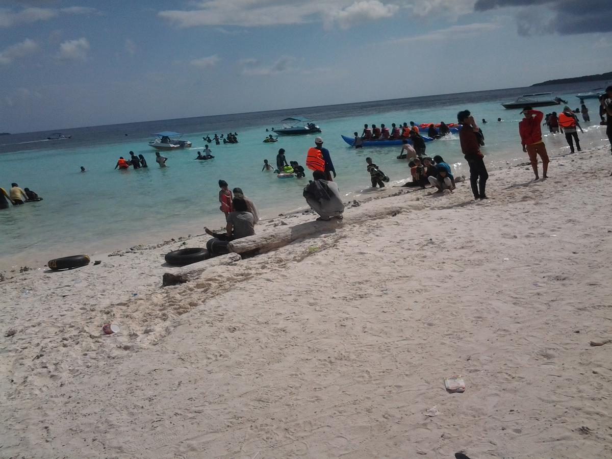 Penginapan Asidik Bira Buitenkant foto