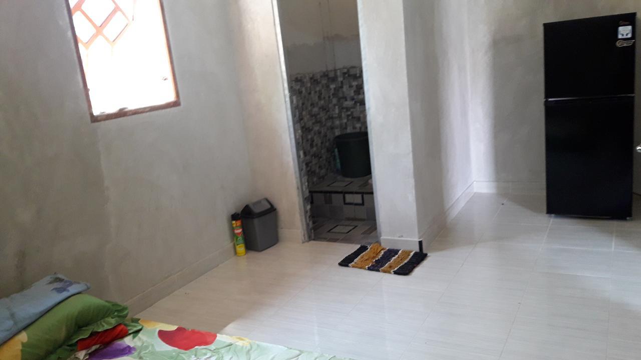 Penginapan Asidik Bira Buitenkant foto
