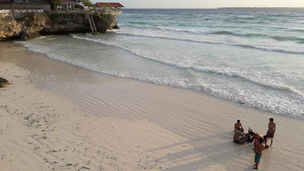 Penginapan Asidik Bira Buitenkant foto