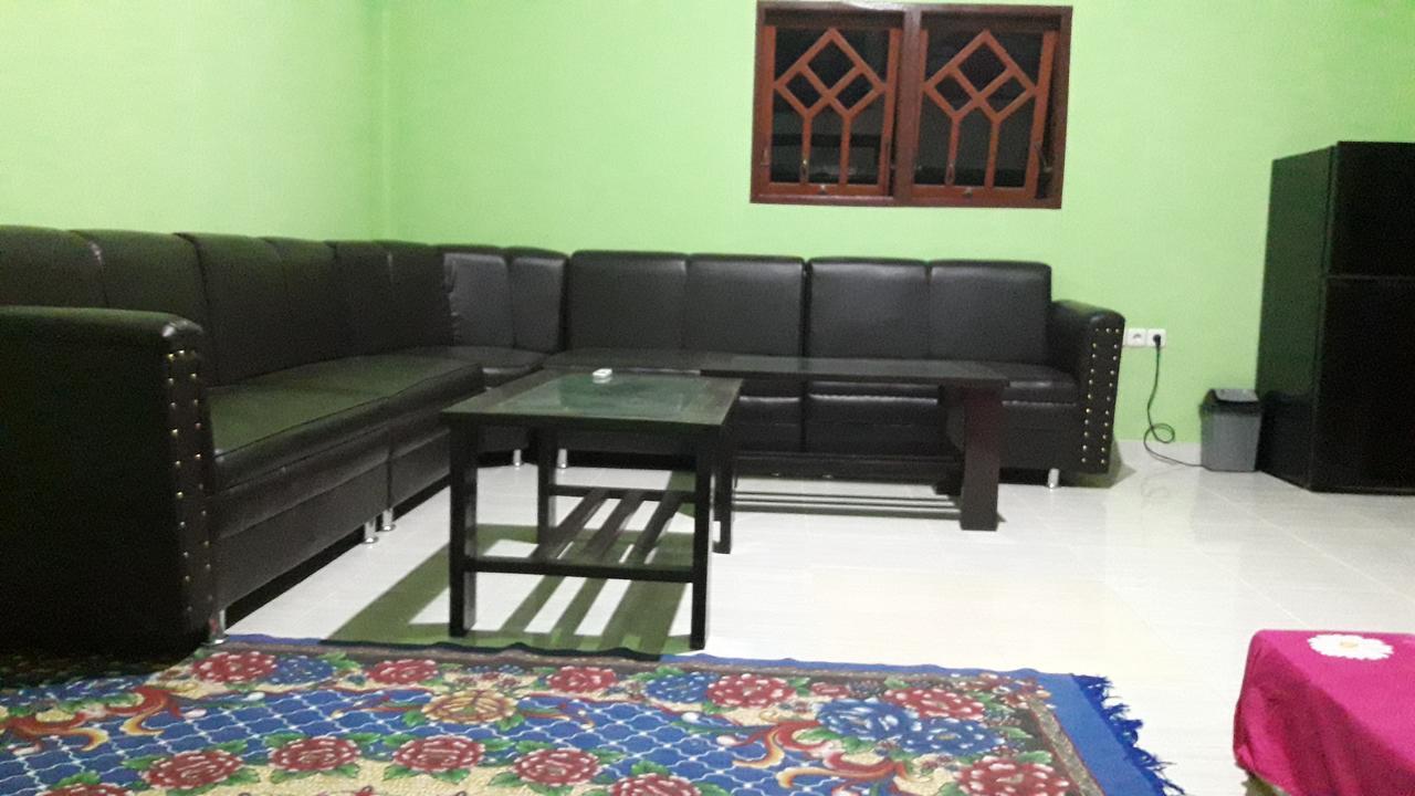 Penginapan Asidik Bira Buitenkant foto