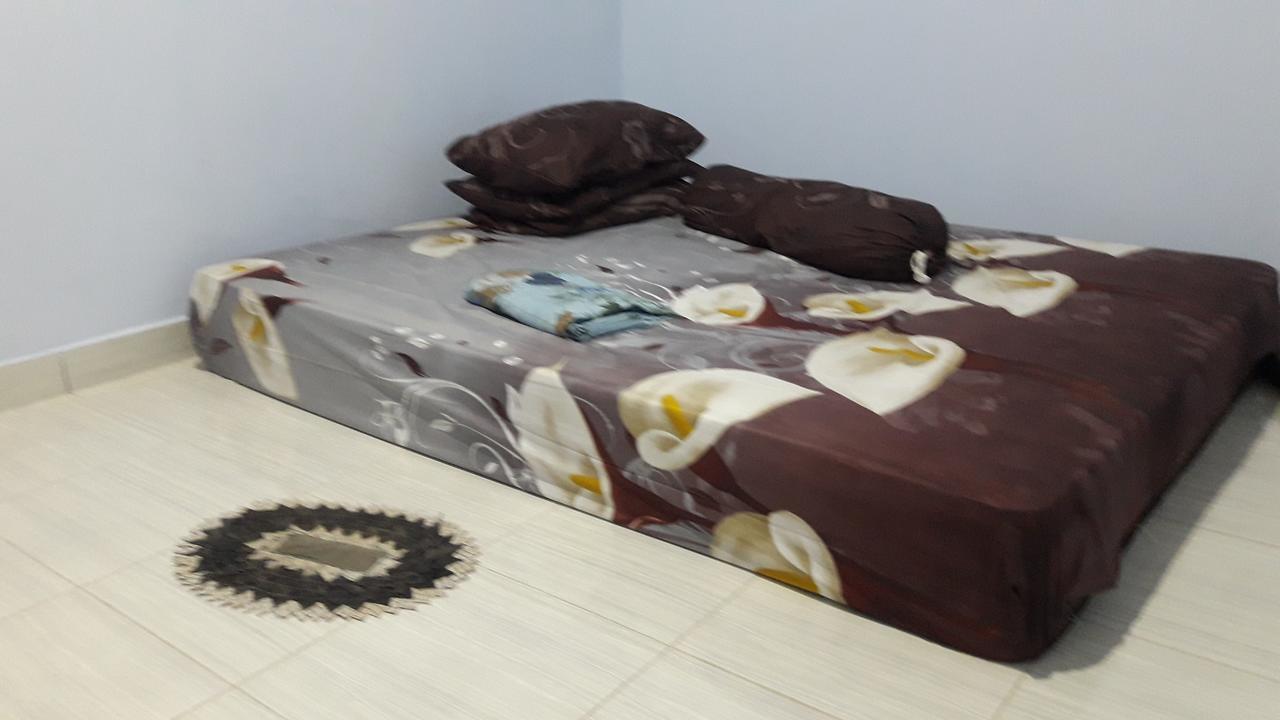 Penginapan Asidik Bira Buitenkant foto