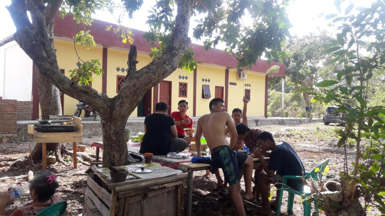 Penginapan Asidik Bira Buitenkant foto